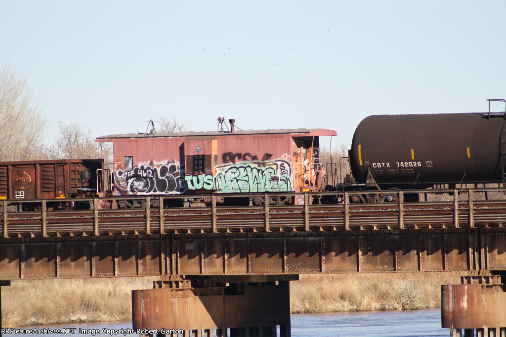 SP 4612 was tucked into the middle of a long manifest train headed east